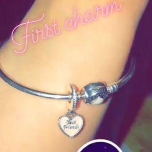 Pandora bracelet with charm.